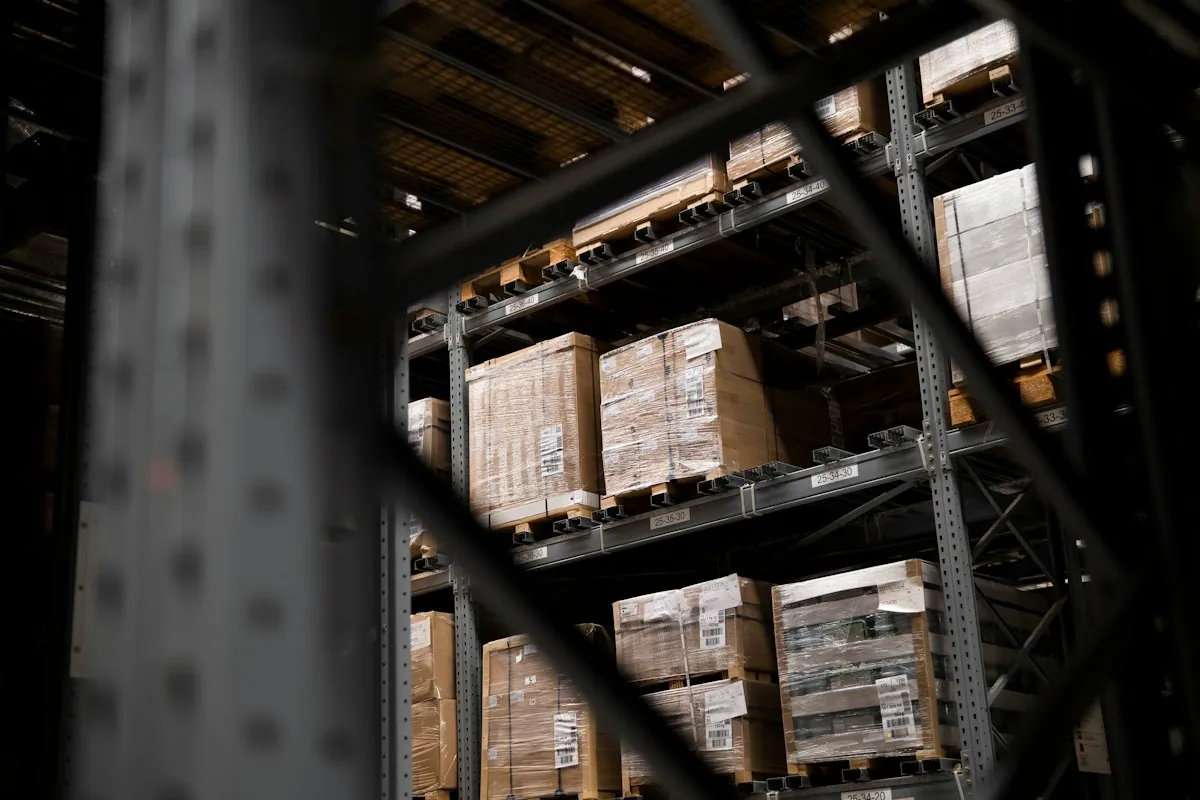 Pallets of goods stacked on warehouse racking