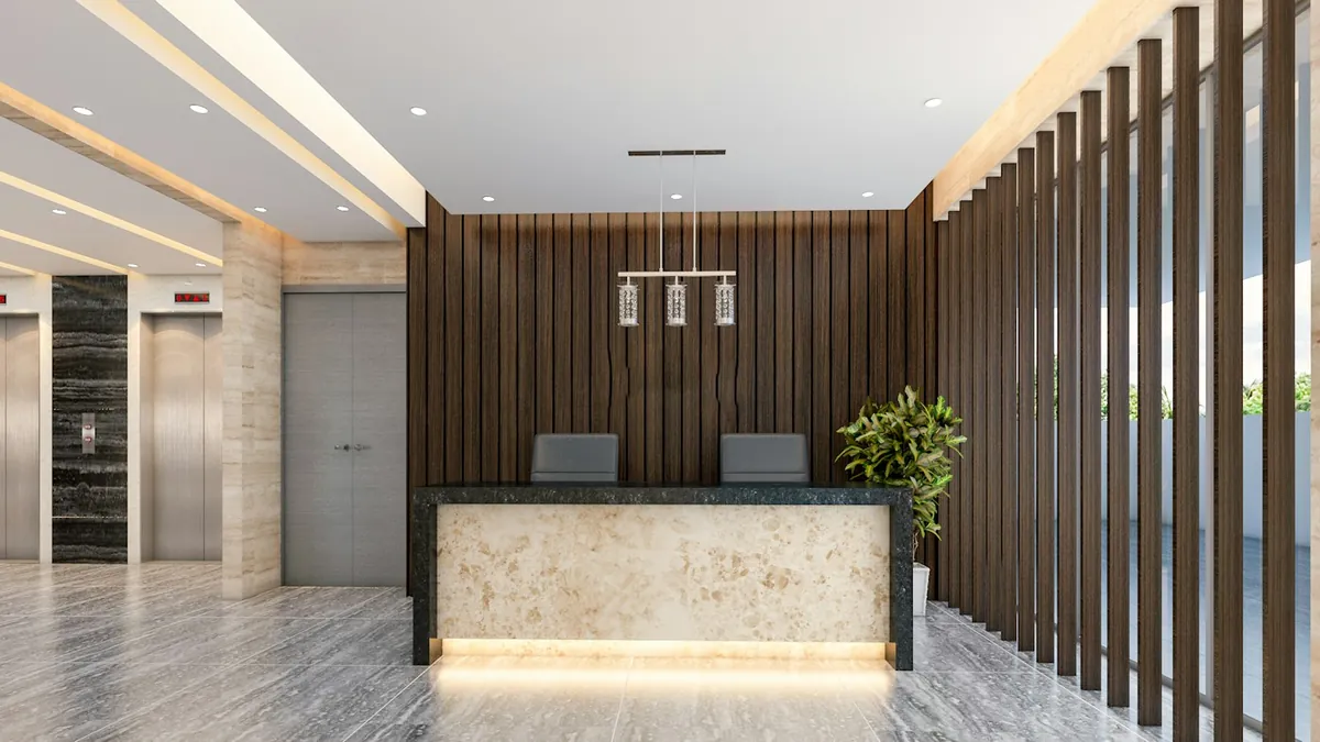 Modern building lobby with lifts and reception desk